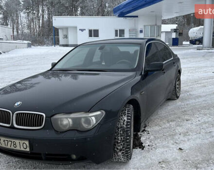 Черный БМВ 7 Серия, объемом двигателя 3 л и пробегом 400 тыс. км за 6500 $, фото 1 на Automoto.ua