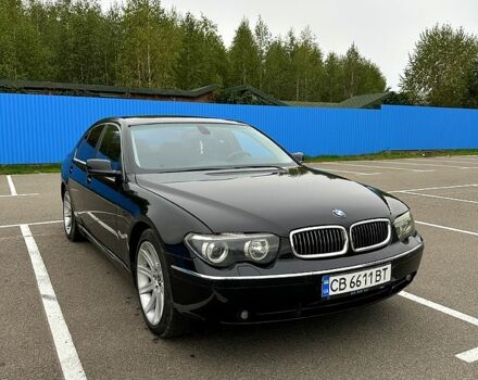 Черный БМВ 7 Серия, объемом двигателя 4.4 л и пробегом 320 тыс. км за 5400 $, фото 1 на Automoto.ua