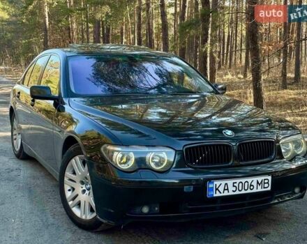 Черный БМВ 7 Серия, объемом двигателя 3 л и пробегом 440 тыс. км за 6500 $, фото 1 на Automoto.ua
