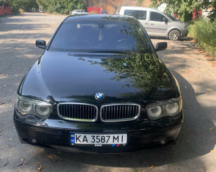 Черный БМВ 7 Серия, объемом двигателя 4.4 л и пробегом 320 тыс. км за 6500 $, фото 1 на Automoto.ua