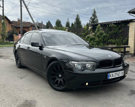 Черный БМВ 7 Серия, объемом двигателя 4.4 л и пробегом 400 тыс. км за 3500 $, фото 1 на Automoto.ua