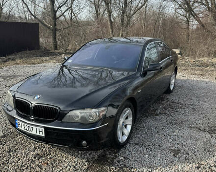 Черный БМВ 7 Серия, объемом двигателя 2.99 л и пробегом 421 тыс. км за 6300 $, фото 1 на Automoto.ua