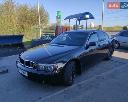 Черный БМВ 7 Серия, объемом двигателя 3 л и пробегом 430 тыс. км за 7300 $, фото 1 на Automoto.ua