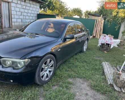 Черный БМВ 7 Серия, объемом двигателя 0 л и пробегом 370 тыс. км за 4000 $, фото 1 на Automoto.ua