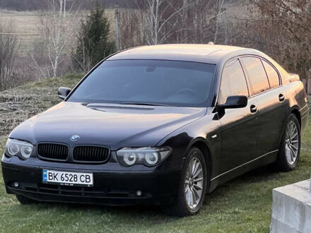 Чорний БМВ 7 Серія, об'ємом двигуна 2.99 л та пробігом 438 тис. км за 6600 $, фото 1 на Automoto.ua