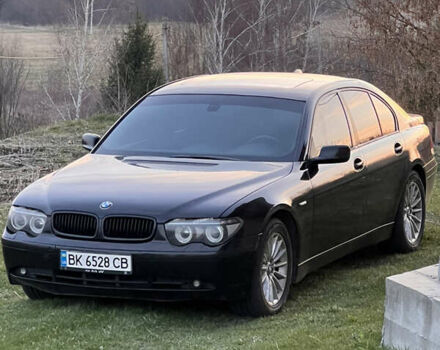 Черный БМВ 7 Серия, объемом двигателя 2.99 л и пробегом 438 тыс. км за 6600 $, фото 1 на Automoto.ua