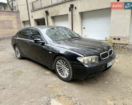 Черный БМВ 7 Серия, объемом двигателя 4.4 л и пробегом 262 тыс. км за 4200 $, фото 1 на Automoto.ua