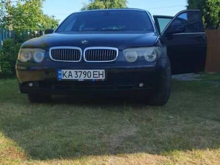 Черный БМВ 7 Серия, объемом двигателя 4.4 л и пробегом 250 тыс. км за 5500 $, фото 1 на Automoto.ua