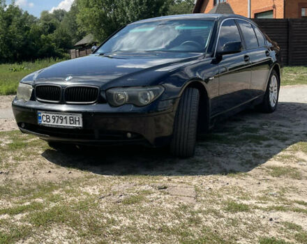Черный БМВ 7 Серия, объемом двигателя 2.98 л и пробегом 295 тыс. км за 5600 $, фото 1 на Automoto.ua