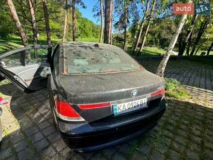 Черный БМВ 7 Серия, объемом двигателя 3.6 л и пробегом 500 тыс. км за 2300 $, фото 1 на Automoto.ua