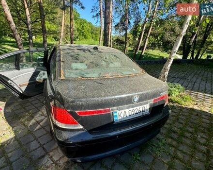 Черный БМВ 7 Серия, объемом двигателя 3.6 л и пробегом 500 тыс. км за 2500 $, фото 1 на Automoto.ua