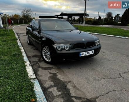 Черный БМВ 7 Серия, объемом двигателя 2.99 л и пробегом 446 тыс. км за 6500 $, фото 1 на Automoto.ua
