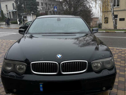 Черный БМВ 7 Серия, объемом двигателя 3 л и пробегом 630 тыс. км за 6500 $, фото 1 на Automoto.ua