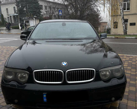 Черный БМВ 7 Серия, объемом двигателя 3 л и пробегом 630 тыс. км за 6500 $, фото 1 на Automoto.ua