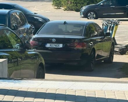 Черный БМВ 7 Серия, объемом двигателя 4 л и пробегом 577 тыс. км за 7200 $, фото 1 на Automoto.ua