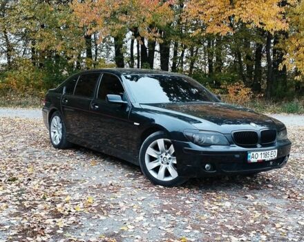 Черный БМВ 7 Серия, объемом двигателя 4 л и пробегом 268 тыс. км за 5500 $, фото 1 на Automoto.ua