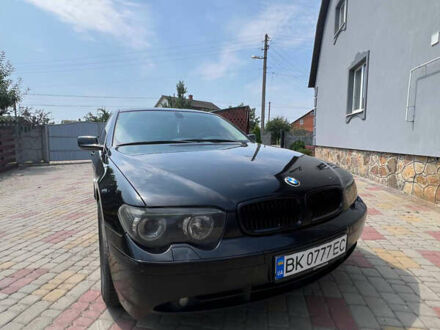 Черный БМВ 7 Серия, объемом двигателя 3 л и пробегом 387 тыс. км за 8500 $, фото 1 на Automoto.ua
