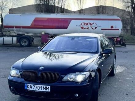 Черный БМВ 7 Серия, объемом двигателя 4.4 л и пробегом 333 тыс. км за 11000 $, фото 1 на Automoto.ua