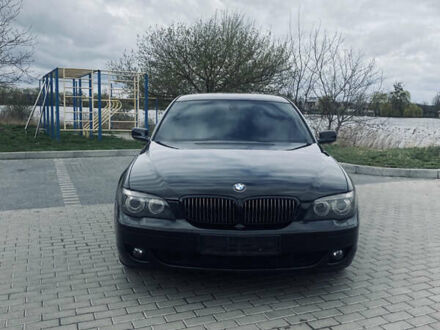 Черный БМВ 7 Серия, объемом двигателя 4.8 л и пробегом 370 тыс. км за 12400 $, фото 1 на Automoto.ua