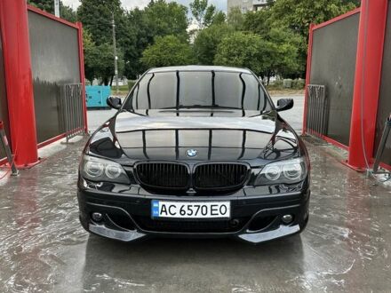 Черный БМВ 7 Серия, объемом двигателя 4 л и пробегом 220 тыс. км за 9500 $, фото 1 на Automoto.ua