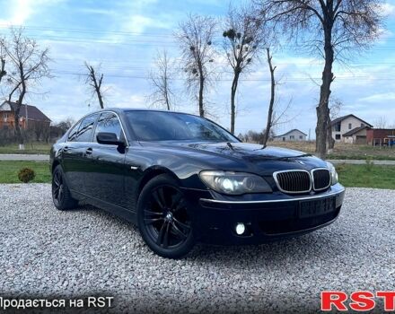 Черный БМВ 7 Серия, объемом двигателя 3 л и пробегом 307 тыс. км за 11000 $, фото 1 на Automoto.ua