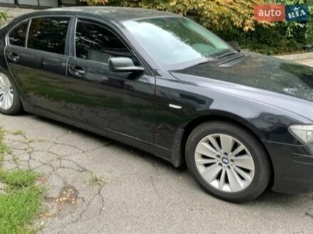 Черный БМВ 7 Серия, объемом двигателя 4 л и пробегом 385 тыс. км за 6000 $, фото 1 на Automoto.ua