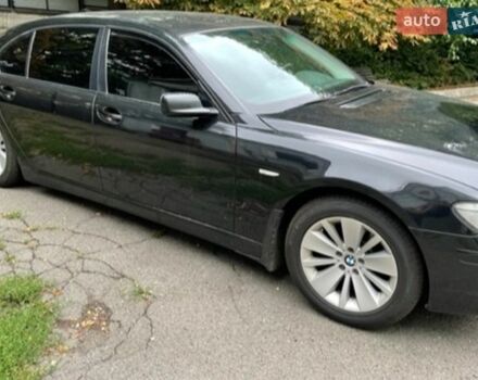 Черный БМВ 7 Серия, объемом двигателя 4 л и пробегом 385 тыс. км за 6000 $, фото 1 на Automoto.ua
