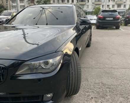 Черный БМВ 7 Серия, объемом двигателя 4.4 л и пробегом 200 тыс. км за 11800 $, фото 1 на Automoto.ua
