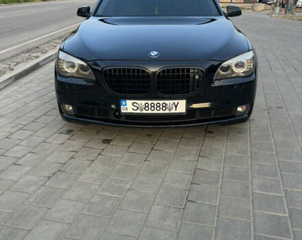 Черный БМВ 7 Серия, объемом двигателя 4.4 л и пробегом 300 тыс. км за 10500 $, фото 1 на Automoto.ua