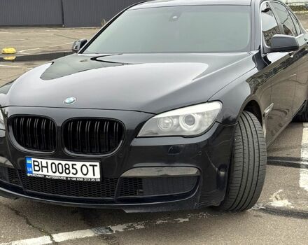 Черный БМВ 7 Серия, объемом двигателя 3 л и пробегом 200 тыс. км за 12400 $, фото 1 на Automoto.ua
