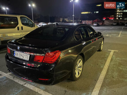 Черный БМВ 7 Серия, объемом двигателя 2.99 л и пробегом 290 тыс. км за 19000 $, фото 1 на Automoto.ua