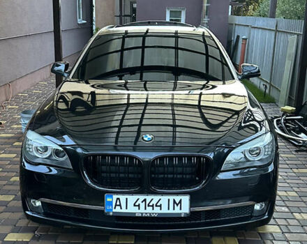 Черный БМВ 7 Серия, объемом двигателя 2.98 л и пробегом 147 тыс. км за 18000 $, фото 1 на Automoto.ua