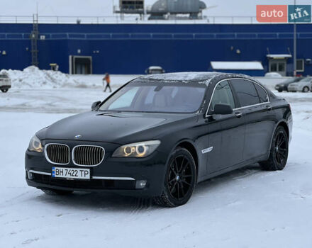 Черный БМВ 7 Серия, объемом двигателя 4.4 л и пробегом 253 тыс. км за 13500 $, фото 1 на Automoto.ua