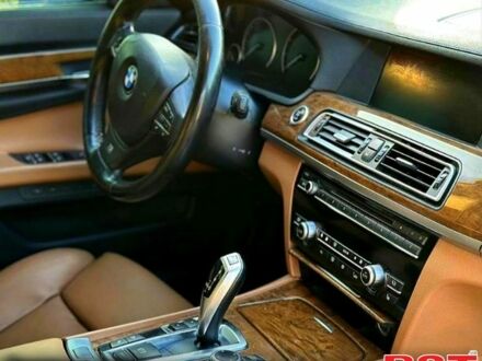 Черный БМВ 7 Серия, объемом двигателя 4.4 л и пробегом 202 тыс. км за 10500 $, фото 1 на Automoto.ua