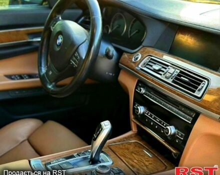 Чорний БМВ 7 Серія, об'ємом двигуна 4.4 л та пробігом 202 тис. км за 10500 $, фото 1 на Automoto.ua