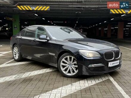 Черный БМВ 7 Серия, объемом двигателя 2.99 л и пробегом 295 тыс. км за 13490 $, фото 1 на Automoto.ua