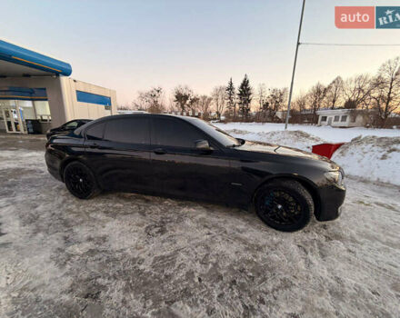 Чорний БМВ 7 Серія, об'ємом двигуна 3 л та пробігом 180 тис. км за 18999 $, фото 1 на Automoto.ua