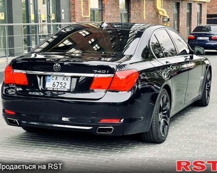 Черный БМВ 7 Серия, объемом двигателя 3 л и пробегом 210 тыс. км за 13200 $, фото 1 на Automoto.ua