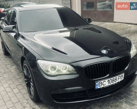 Черный БМВ 7 Серия, объемом двигателя 2.98 л и пробегом 285 тыс. км за 12500 $, фото 1 на Automoto.ua