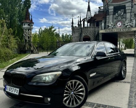 Черный БМВ 7 Серия, объемом двигателя 3 л и пробегом 213 тыс. км за 14995 $, фото 1 на Automoto.ua
