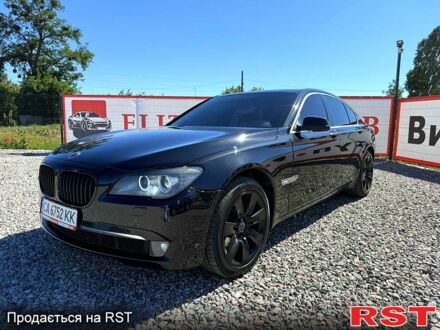 Чорний БМВ 7 Серія, об'ємом двигуна 3 л та пробігом 214 тис. км за 14999 $, фото 1 на Automoto.ua