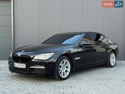 Черный БМВ 7 Серия, объемом двигателя 3 л и пробегом 176 тыс. км за 18700 $, фото 1 на Automoto.ua