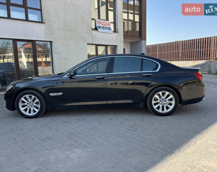 Черный БМВ 7 Серия, объемом двигателя 3 л и пробегом 196 тыс. км за 18600 $, фото 1 на Automoto.ua