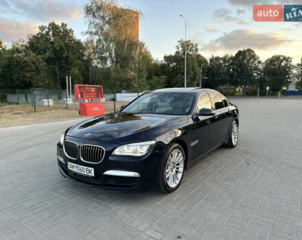 Черный БМВ 7 Серия, объемом двигателя 2.99 л и пробегом 80 тыс. км за 27900 $, фото 1 на Automoto.ua