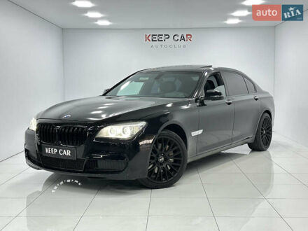 Черный БМВ 7 Серия, объемом двигателя 2.98 л и пробегом 199 тыс. км за 15300 $, фото 1 на Automoto.ua