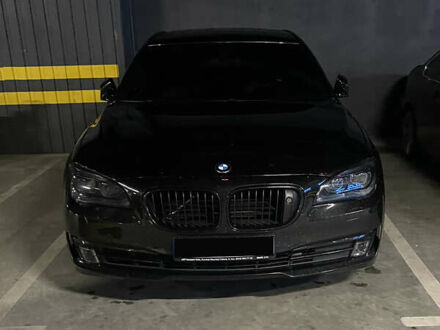 Черный БМВ 7 Серия, объемом двигателя 4.4 л и пробегом 252 тыс. км за 20800 $, фото 1 на Automoto.ua