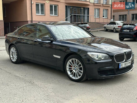 Черный БМВ 7 Серия, объемом двигателя 3 л и пробегом 210 тыс. км за 13500 $, фото 1 на Automoto.ua