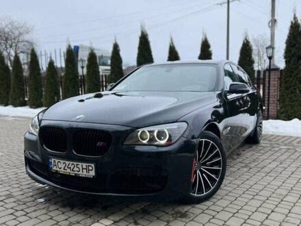 Чорний БМВ 7 Серія, об'ємом двигуна 3 л та пробігом 150 тис. км за 15900 $, фото 1 на Automoto.ua