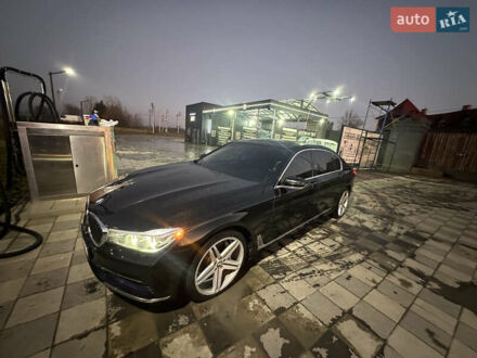 Чорний БМВ 7 Серія, об'ємом двигуна 3 л та пробігом 142 тис. км за 26000 $, фото 1 на Automoto.ua