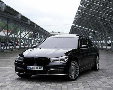 Черный БМВ 7 Серия, объемом двигателя 3 л и пробегом 165 тыс. км за 28000 $, фото 1 на Automoto.ua